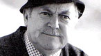 Charles Williams yn chwarae rhan Harri Parri