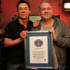 Chris and Dave receive their official certificate from Guiness for the Longest Marathon Radio Show.