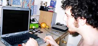 Ciaran hard at work on his laptop