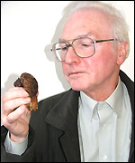 Howard Williams checks out a mushroom