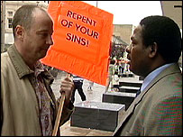 Chris Jackson confronts man with placard