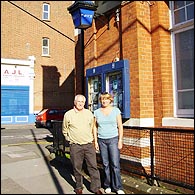 Ralph and Erica Richards under the blue lamp at Muswell Hill Police Station