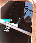 Richard looking down his well