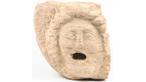 Roman carved stone fountainhead