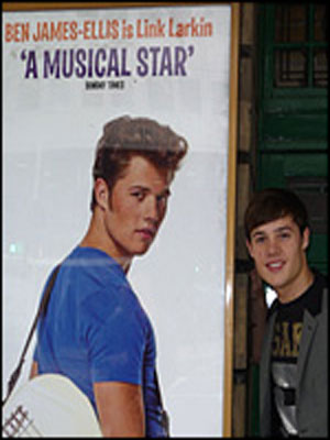 Ben James Ellis with Hairspray poster.