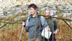 Derek and Kerry passing through an old gate.