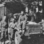 Geoff with three colleagues taking a break somewhere in Germany. Geoff is the one sitting on the bonnet of the Bedford 3 Ton Truck with a box body. Note the White Star which was carried by all Allied vehicles for ease of identification.