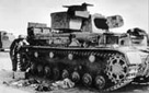 Photograph showing a destroyed German tank