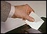 Putting vote into a ballot box