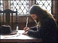 Man seated at a desk