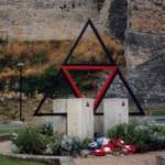Memorial Sculpture to the 3rd British Infantry Division in front of Caen Castle, July 2004 (60th Anniversary). It reads 'To the memory of the men of the 3rd British Infantry Division one of the assault divisions landed on D-Day 6 June 1944 and liberated Caen 9 July 1944'.