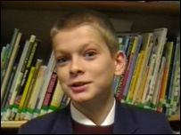 Schoolboy in library