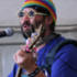 Adam Buxton slams it to the Hub tent crowds...
