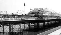 Black and white photograph showing Brighton pier