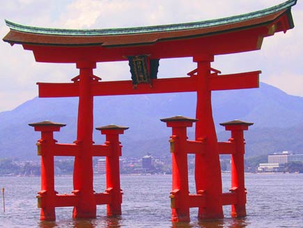 A torii gate leading to the Itsukushima Shrine.
