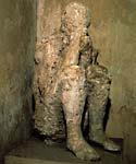  Photograph showing a plaster cast of a victim killed by mount Vesuvius eruption