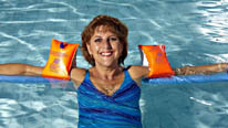 Sandy, 56, learns to swim