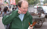 Jim tucks into some local food