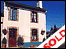 House with sold sign