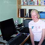Sara at her desk